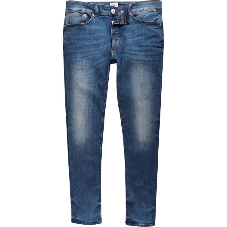 Mid blue wash fade skinny sid jeans laid out